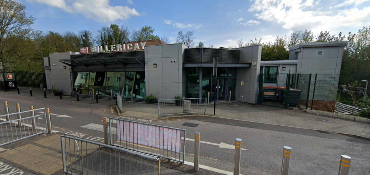 Station exterior with level entrance and clear glazed frontage